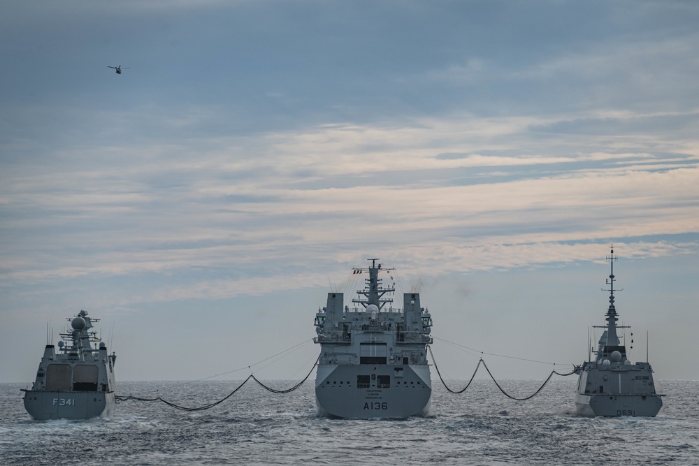 Standing NATO Maritime Group One (SNMG1) ships HDMS Absalon (at left) and FS Normandie (at right) conduct a Replenishment-At-Sea (RAS) with RFA Tidespring during Exercise Steadfast Defender 2021