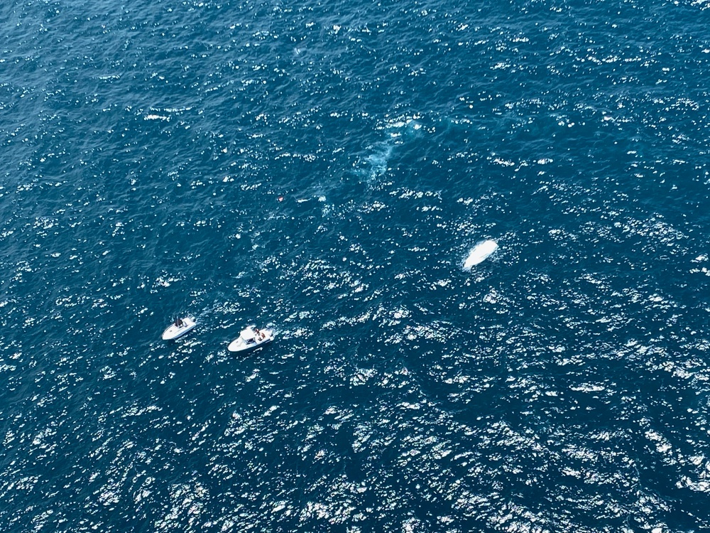 Coast Guard Air Station Clearwater arrives on scene of boat capsizing