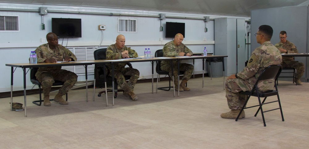 Task Force Spartan Soldier appears before command sergeants majors board during Best Warrior Competition