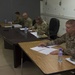 Task Force Spartan Best Warrior Competition 2021, command sergeants majors evaluate Soldiers during board event
