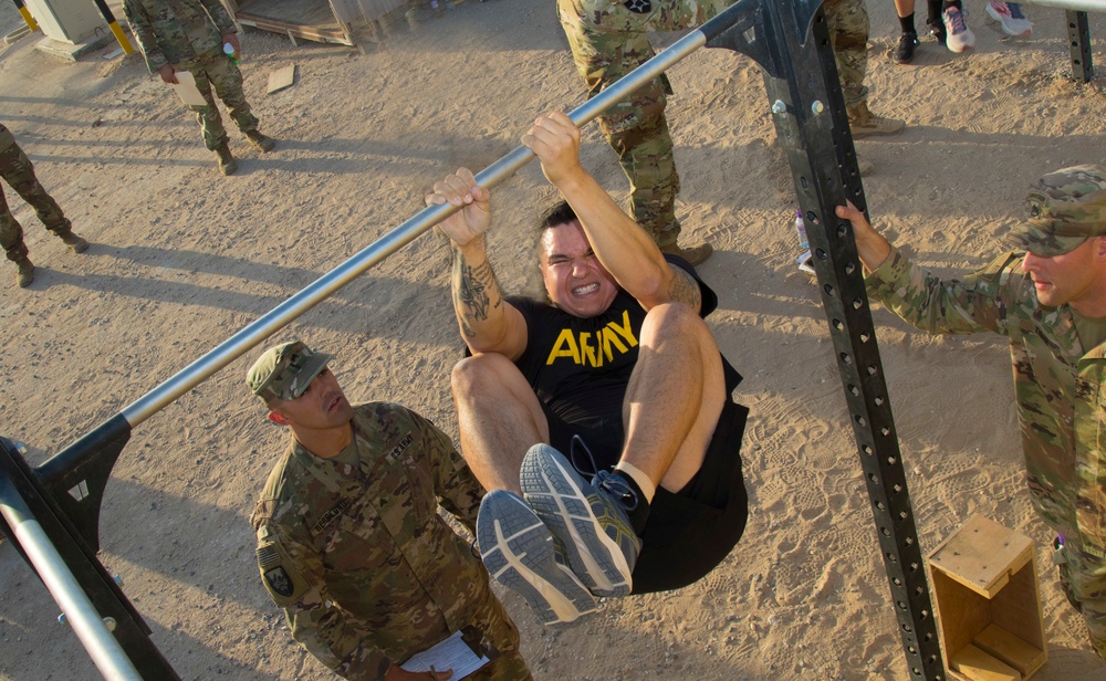 U.S. Army Sgt. Brent Roberts, Task Force Avalanche, completes a Leg Tuck during the Army Combat Fitness Test Best Warrior Competition 2021