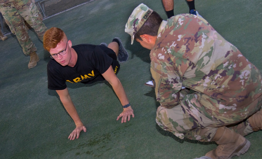 U.S. Army Spc. Peter Frey, TF Hellhound, completes Hand Release Push-up during TF Spartan BWC 2021 ACFT