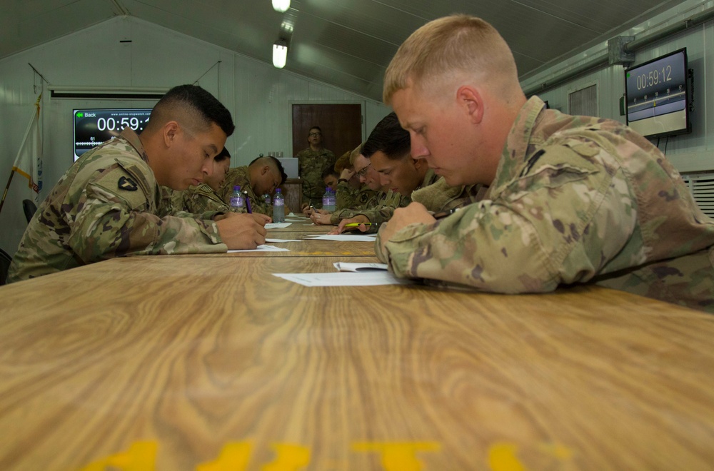 Task Force Spartan Soldiers take written test during BWC 2021
