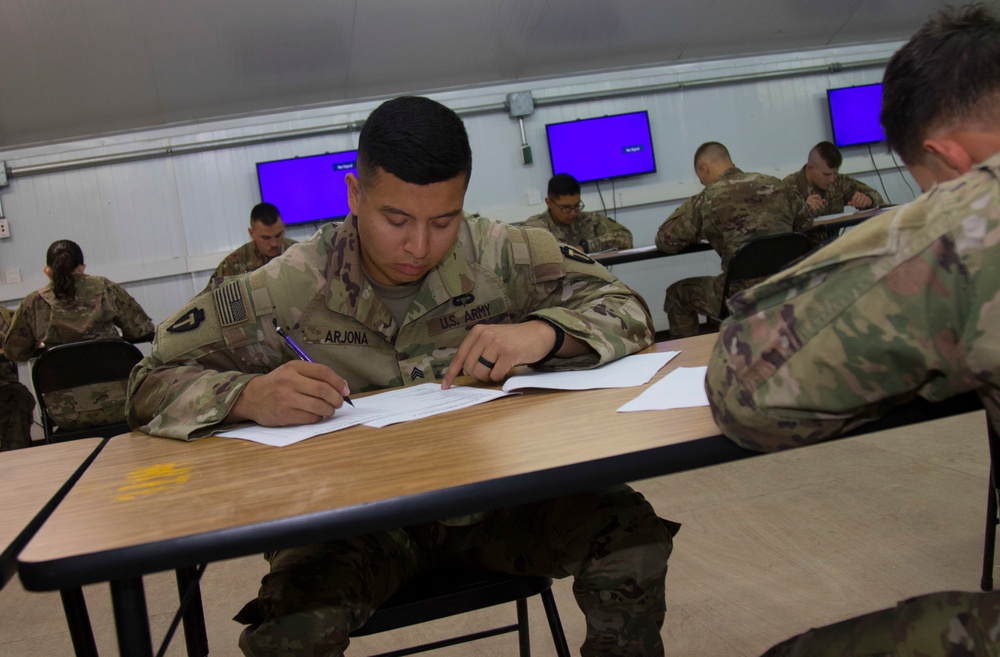 Task Force Spartan Soldiers take written test during BWC 2021