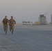 Task Force Hellhound Soldier sprints toward the finish line of 12-Mile Ruck March, Best Warrior Competition 2021