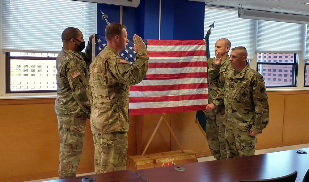 NCOA Instructor Sgt. 1st Class Erek D. Pittman Reenlists for Indefinite Service