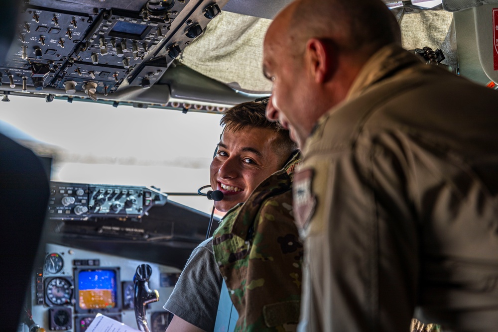 332d AEW assigned KC-135s, forward deployed in CENTCOM, accomplish hot pit refuel