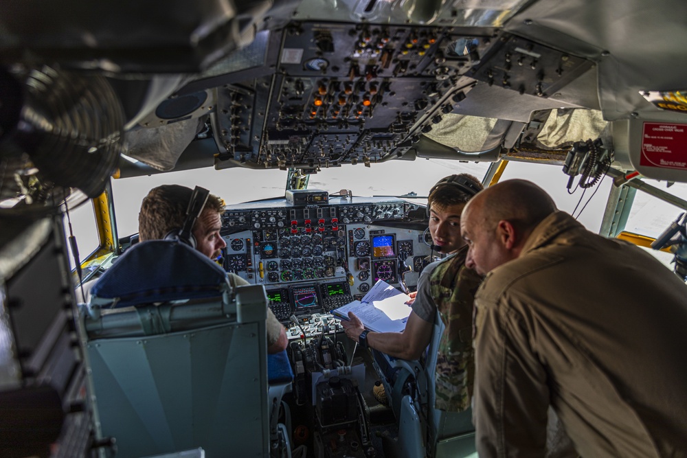 332d AEW assigned KC-135s, forward deployed in CENTCOM, accomplish hot pit refuel