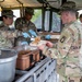 The 1-3rd Attack Battalion enjoys hot chow during DEFENDER-Europe 21