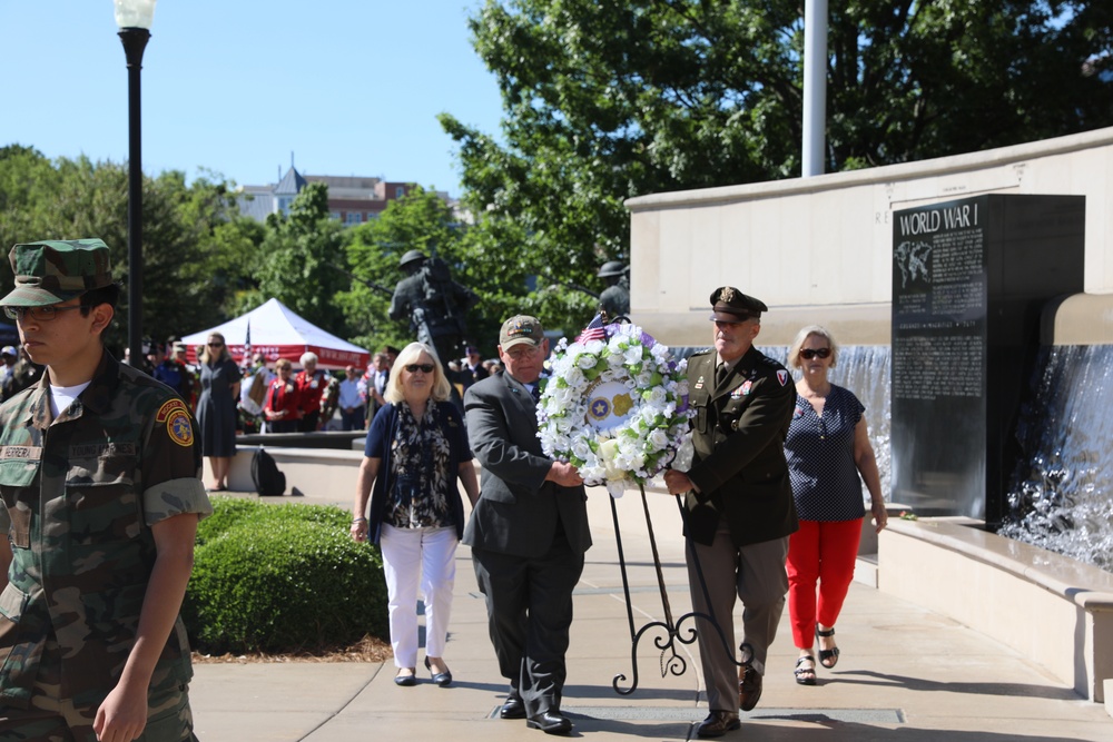 LAYING GOLD STAR WREATH