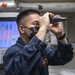 Sailor conducts a FISII test of JP-5 fuel