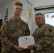 U.S. Army Spc. Peter Frey, Task Force Hellhound, accepts award as junior enlisted runner-up in the TF Spartan Best Warrior Competition 2021