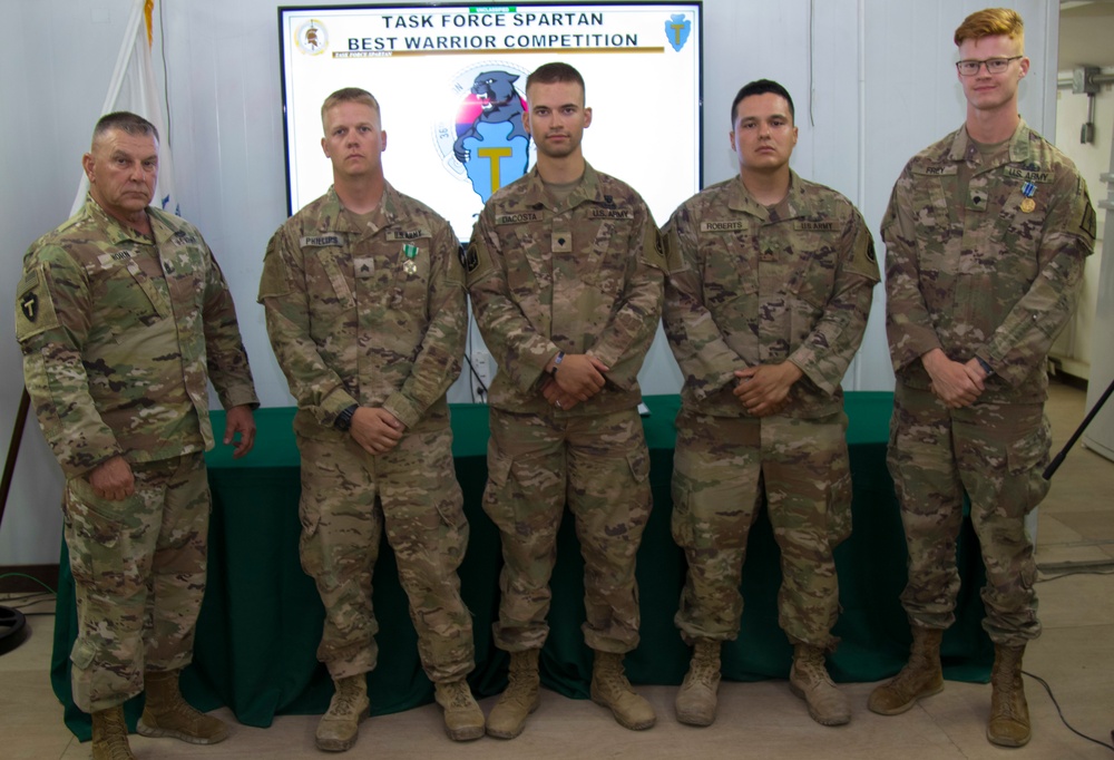 The winners and runner-ups of Task Force Spartan Best Warrior Competition 2021 pose with TF Spartan leadership after accepting awards