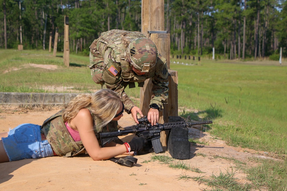 Gila Battalion spouses conduct portions of M4 rifle qualification
