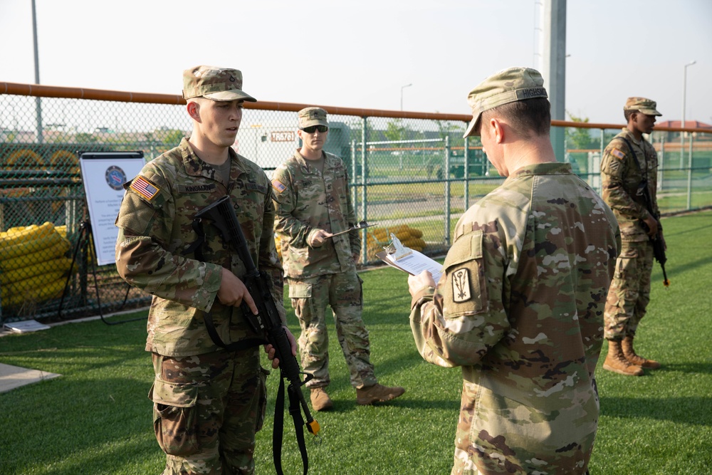 USARPAC BWC 2021: South Korea, Pfc. Kyle Kingman, a 311th Theater Tactical Signal Brigade soldier, conducts a weapons check on an M4 carbine