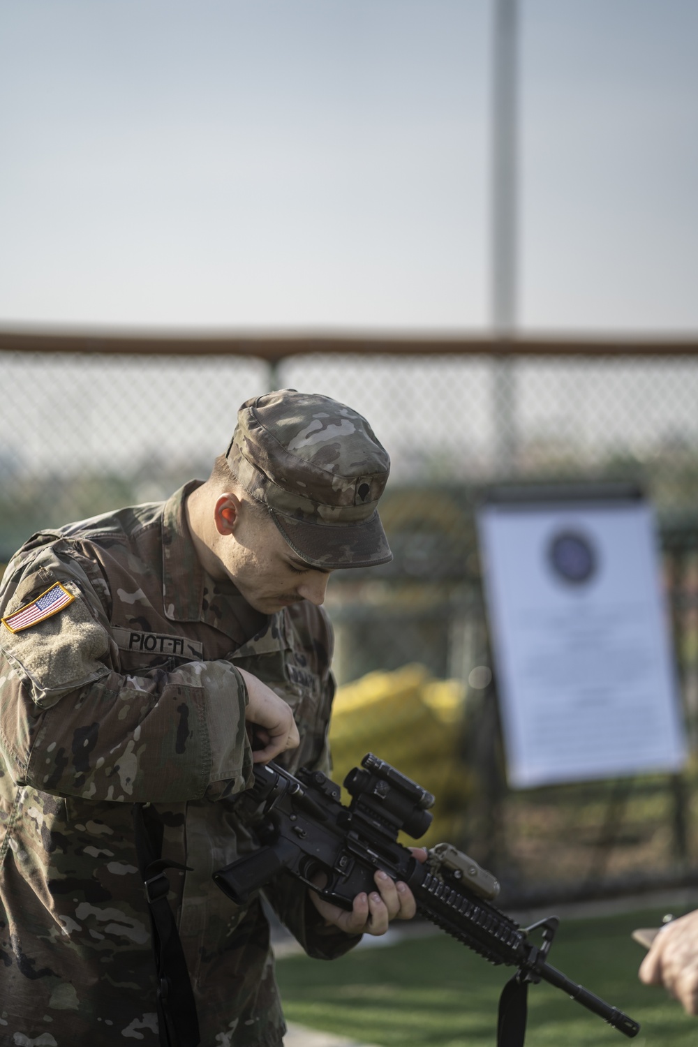 USARPAC BWC 2021: South Korea, Spc. Seth Piotti, an Eighth Army soldier, conducts a weapons check on an M4 carbine
