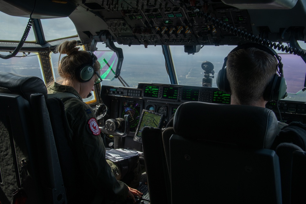Flying Jennies provide airlift, airdrop during Voyager Shield