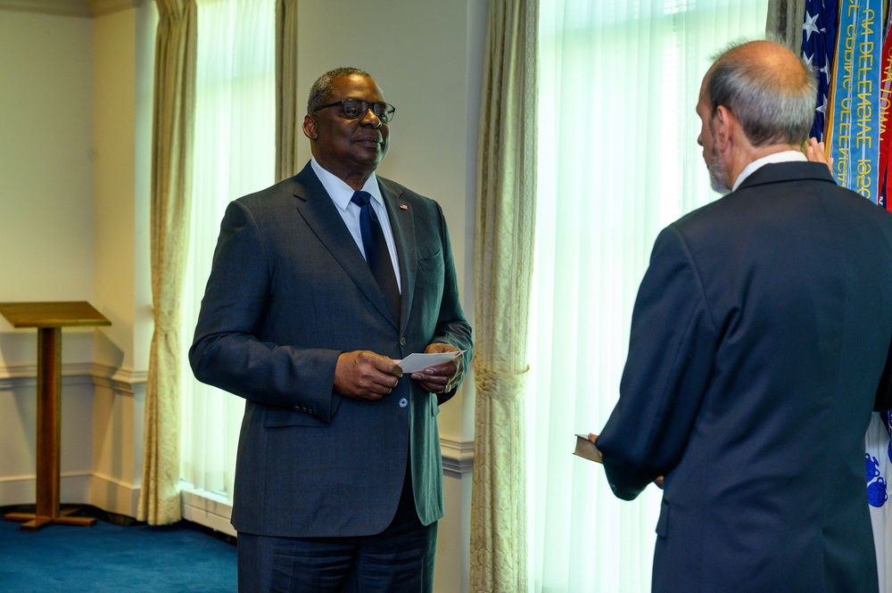 Secretary of Defense Lloyd J. Austin III swears in Under Secretary of Defense for Comptroller Michael McCord