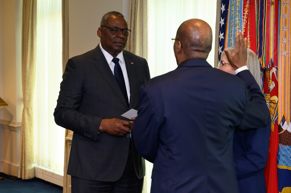 Secretary of Defense Lloyd J. Austin III swears in Under Secretary of Defense for Intelligence and Security Ronald Moultrie