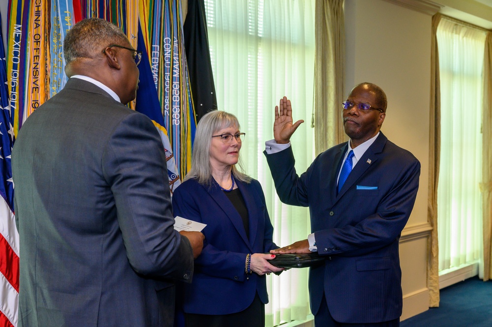 Secretary of Defense Lloyd J. Austin III swears in Under Secretary of Defense for Intelligence and Security Ronald Moultrie