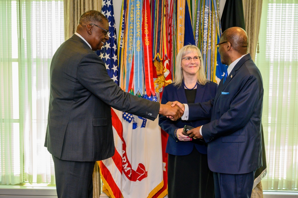 Secretary of Defense Lloyd J. Austin III swears in Under Secretary of Defense for Intelligence and Security Ronald Moultrie