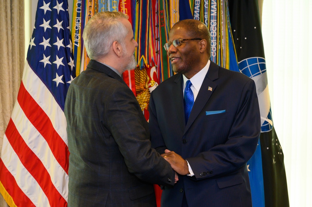 Secretary of Defense Lloyd J. Austin III swears in Under Secretary of Defense for Intelligence and Security Ronald Moultrie