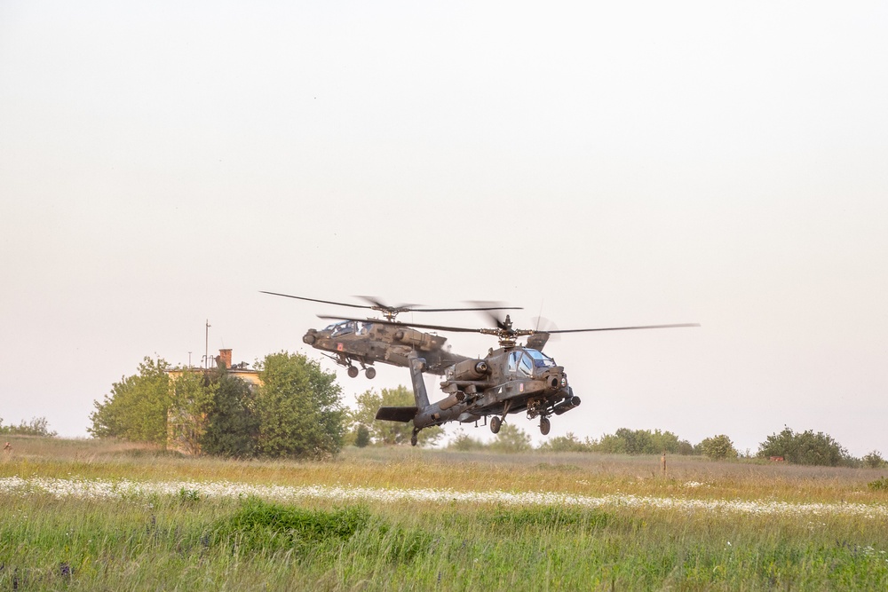 Attack Helicopters from the 1-3rd Attack Battalion land in Tazar in support of Saber Guardian