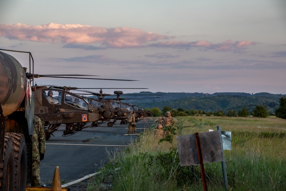 Attack Helicopters from the 1-3rd Attack Battalion land in Tazar in support of Saber Guardian