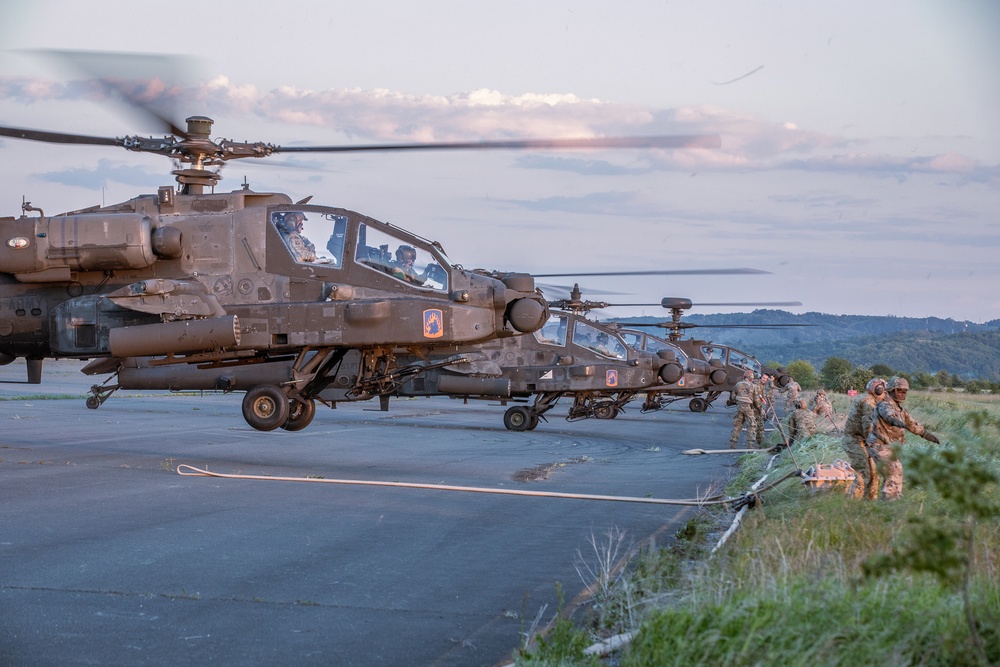 Attack Helicopters from the 1-3rd Attack Battalion land in Tazar in support of Saber Guardian