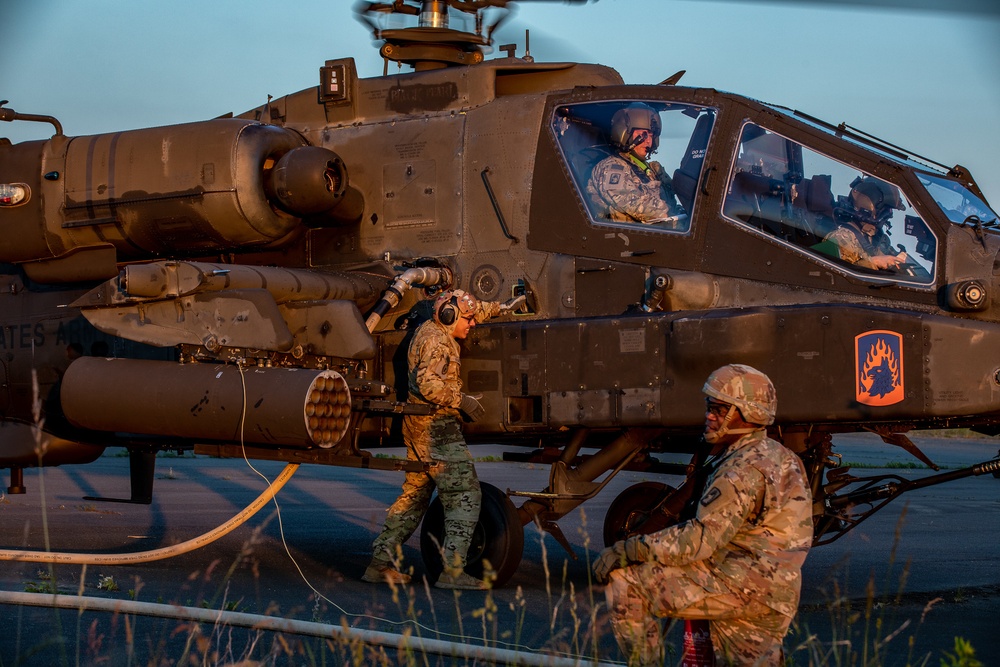 Attack Helicopters from the 1-3rd Attack Battalion land in Tazar in support of Saber Guardian