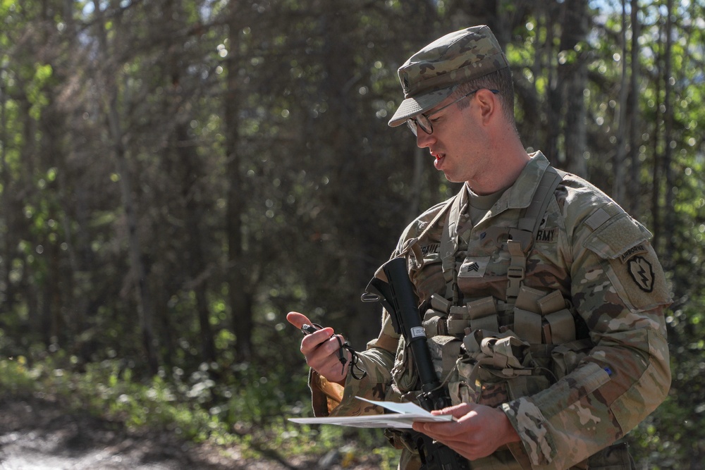 USARPAC BWC 2021: Alaska, Sgt. Adam Krauland checks the time on Land Navigation