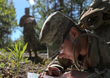 USARPAC BWC 2021: Alaska, USARAK Soldier plots points for Land Navigation