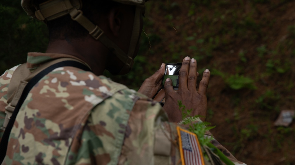 USARPAC BWC 2021: South Korea, United States Army Japan, Sgt. Jamal Walker applying camoflauge to the face