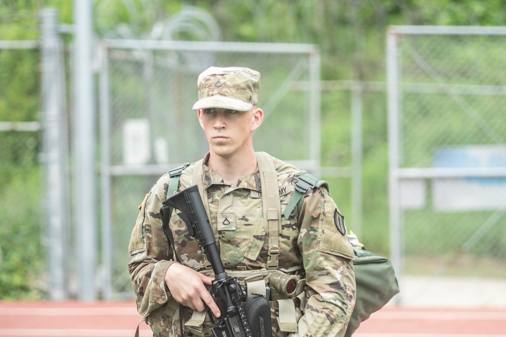 USARPAC BWC 2021: South Korea, 311th Theater Tactical Signal Brigade, Pfc. Kyle Kingman gets briefed on the Warrior Tasks and Battle Drills lane