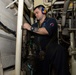 USS Sioux City Sailor Conducts Maintenance on Machinery