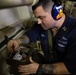 USS Sioux City Sailor Conducts Maintenance on Machinery