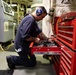 USS Sioux City Sailor Prepares to Conduct Maintenance on Machinery