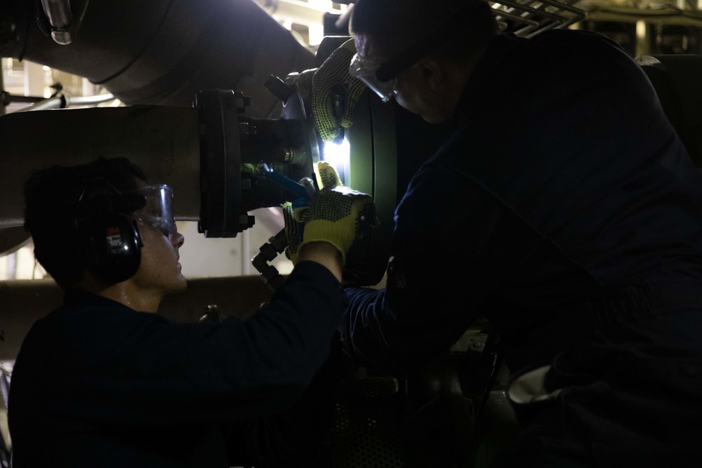 USS Sioux City Sailors Conduct Maintenance on Machinery