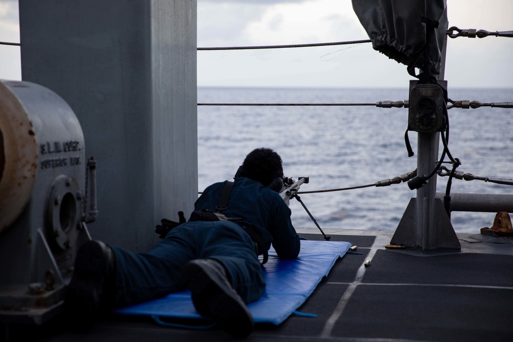 USS Sioux City Sailor Participates in a .50-Caliber Machine Gun Shoot