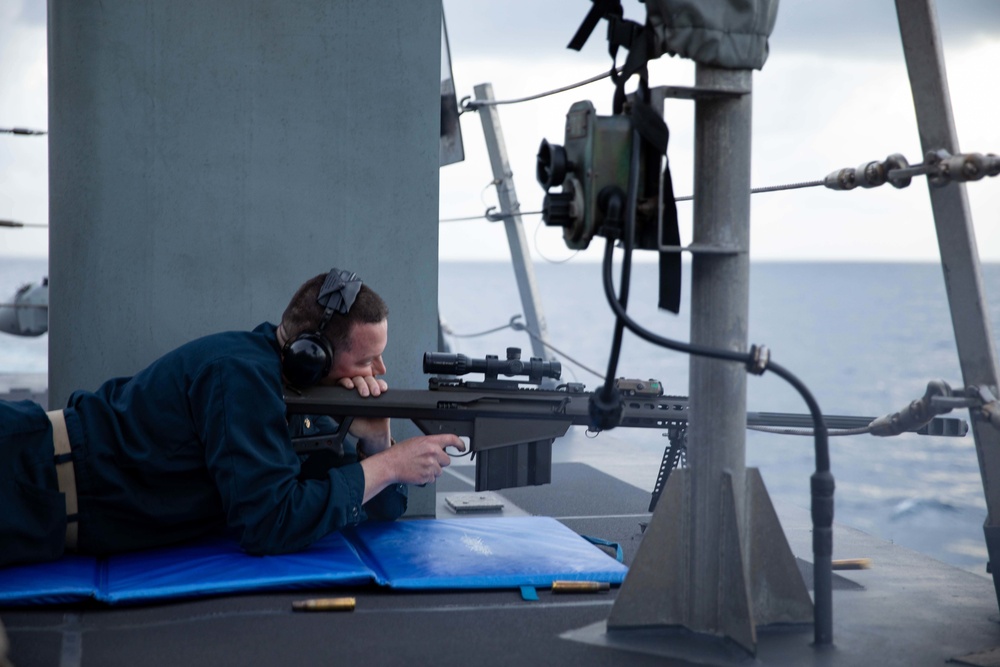 USS Sioux City Sailor Participates in a .50-Caliber Machine Gun Shoot