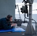 USS Sioux City Sailor Participates in a .50-Caliber Machine Gun Shoot