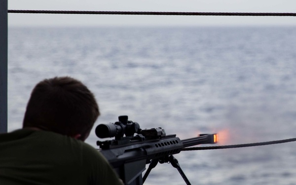 Coast Guardsman Participates in a .50-Caliber Machine Gun Shoot