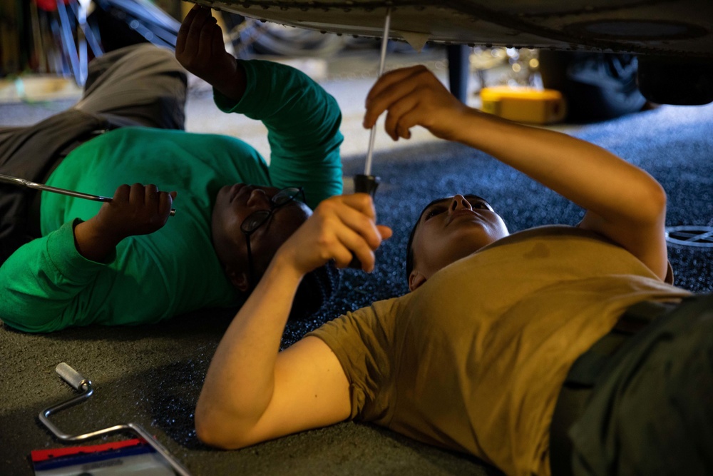 HSC 22 Sailors Conduct Maintenance on an MH-60S Sea Hawk Helicopter