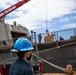 USS Sioux City Sailor Participates in a Stores Onload While is in Puerto Rico