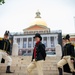 USS Constitution’s Commanding Officer Cmdr. John Benda walks the freedom trail