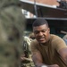 Airman Jabari Shabazz, from Atlanta Georgia, hauls lines to assist the rest of the crew with furling ‘Old Ironsides’ spanker sail