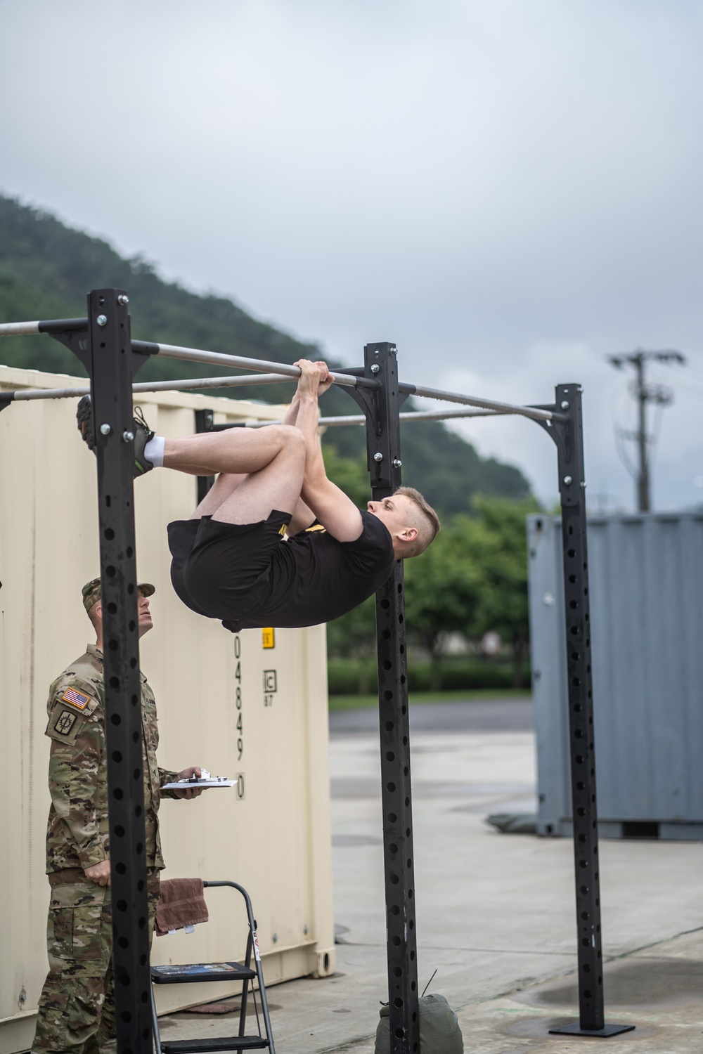 USARPAC BWC 2021: South Korea, Eighth Army, Sgt. Steven Levesque preforms the Leg Tuck exercise