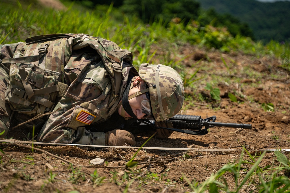 USARPAC BWC 2021: South Korea, 94th Army Air and Missile Defense Command, Spc. Uriel Trejo low crawls for a Live Fire event