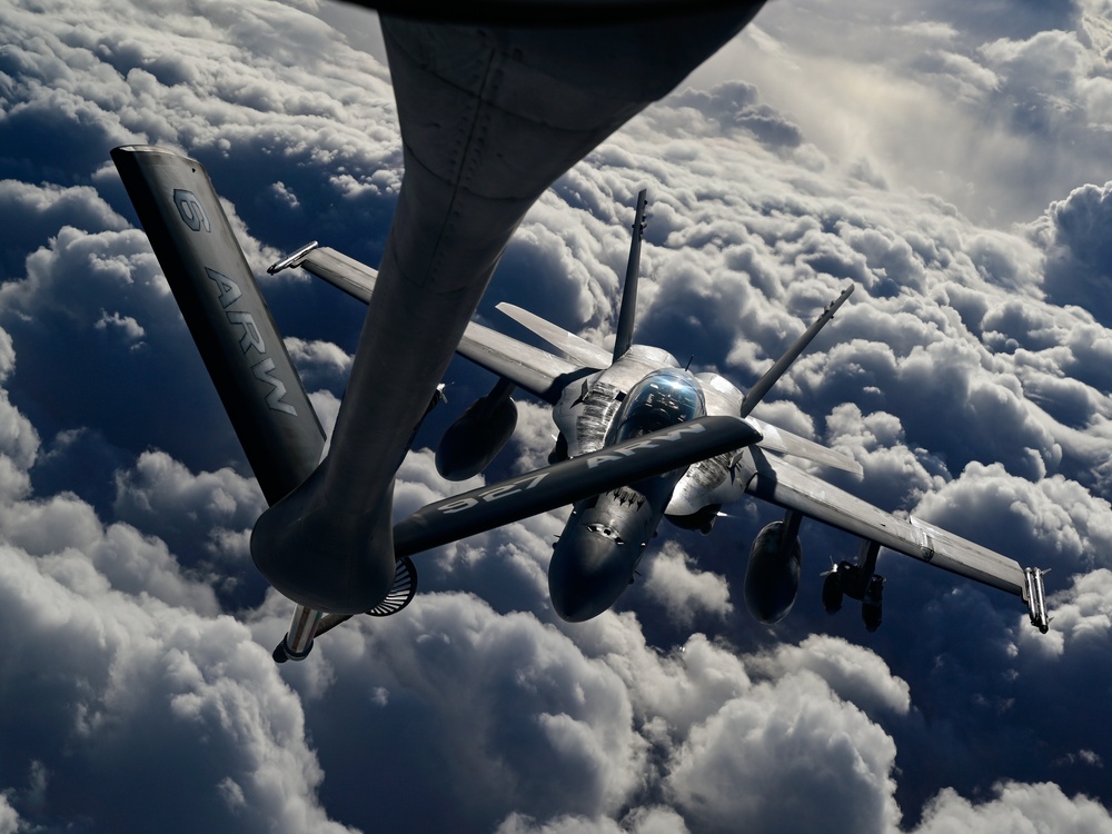 340th EARS refuel Marine F/A-18 fighters