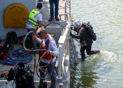 Deep down, Pittsburgh divers have thick skin under water